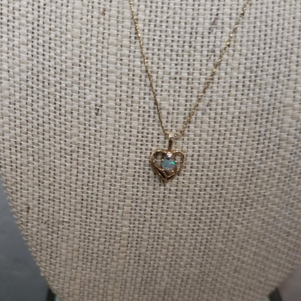 10K Yellow Gold Opal Diamond Pendant Chain is 14K Yellow Gold 16"